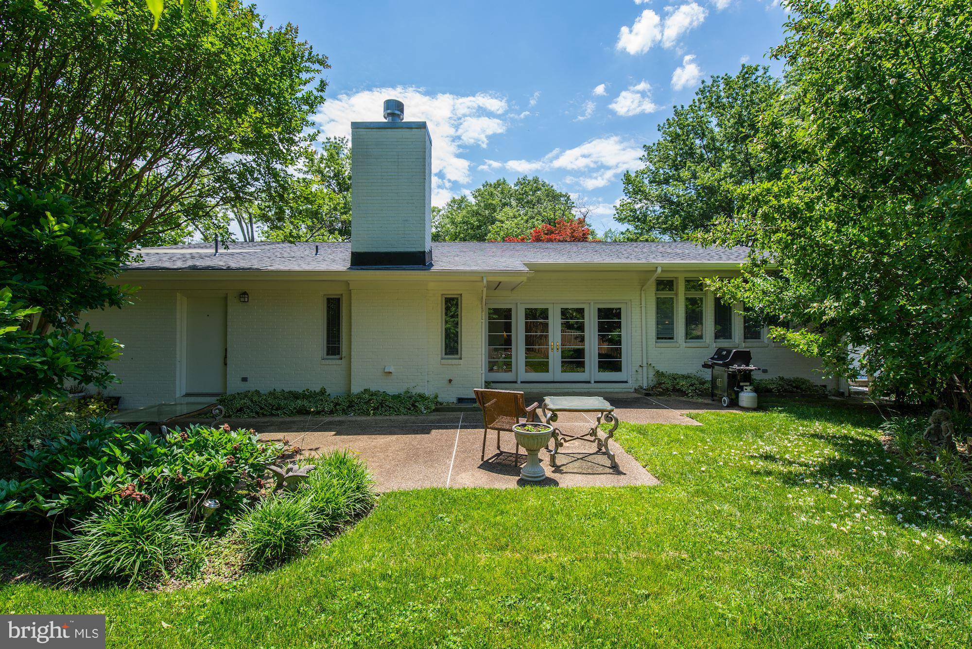 6129 Overlea Road Bethesda, MD 20816 - Photo 2 of 30 a house view with a garden space