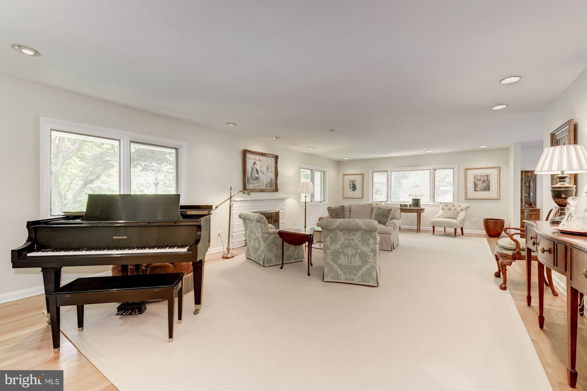 6129 Overlea Road Bethesda, MD 20816 - Photo 12 of 30 a living room with furniture and a piano