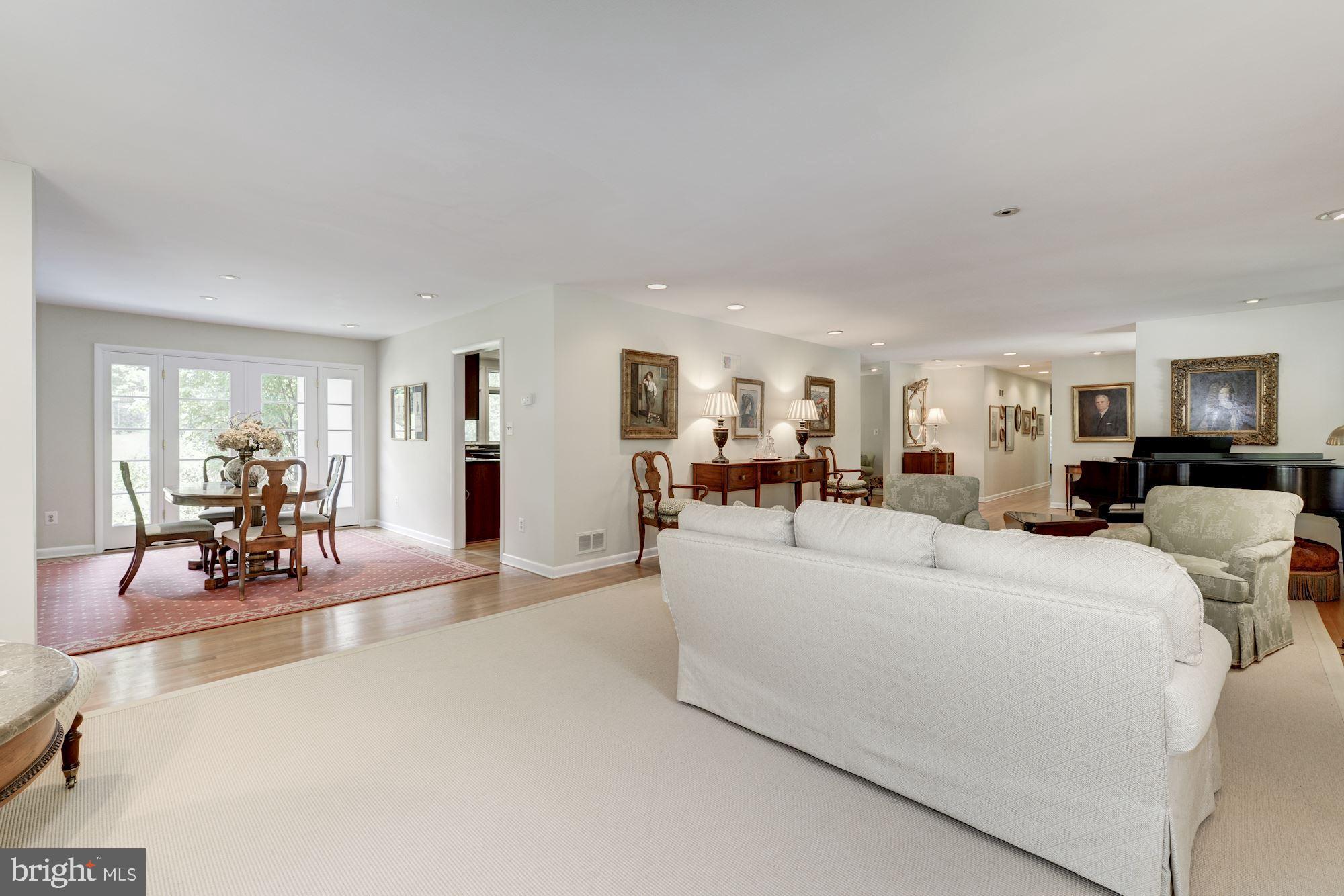 6129 Overlea Road Bethesda, MD 20816 - Photo 15 of 30 a living room with furniture and a wooden floor
