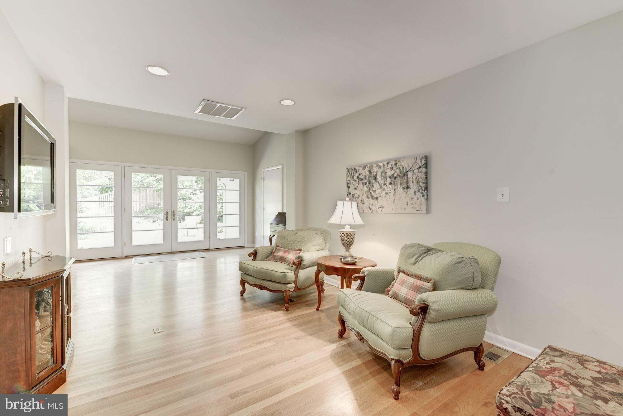 6129 Overlea Road Bethesda, MD 20816 - Photo 21 of 30 a living room with furniture and a large window