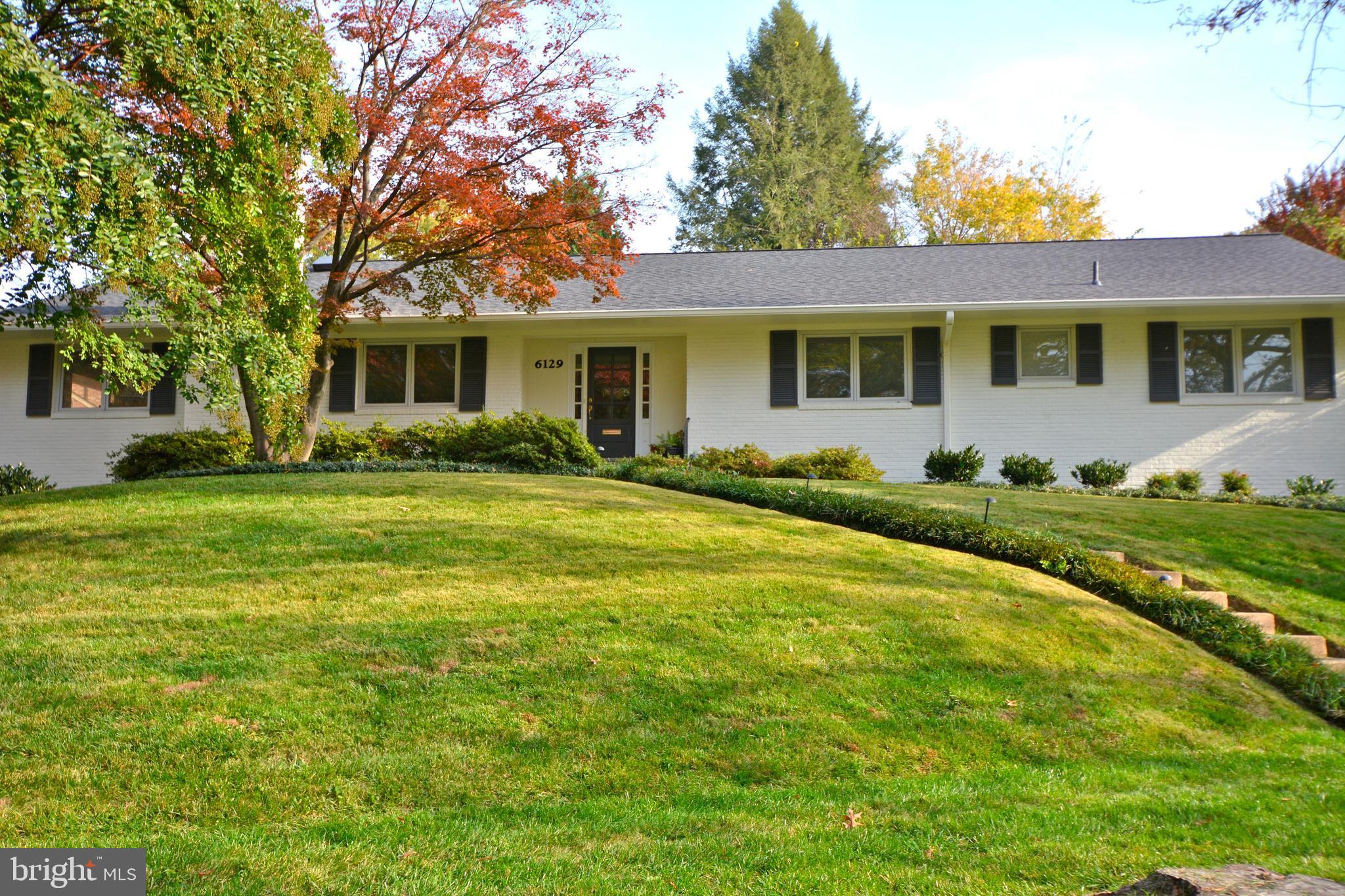 6129 Overlea Road Bethesda, MD 20816 - Photo 28 of 30 a front view of house with yard and green space