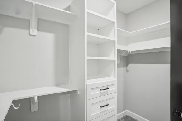 a view of an empty walk in closet