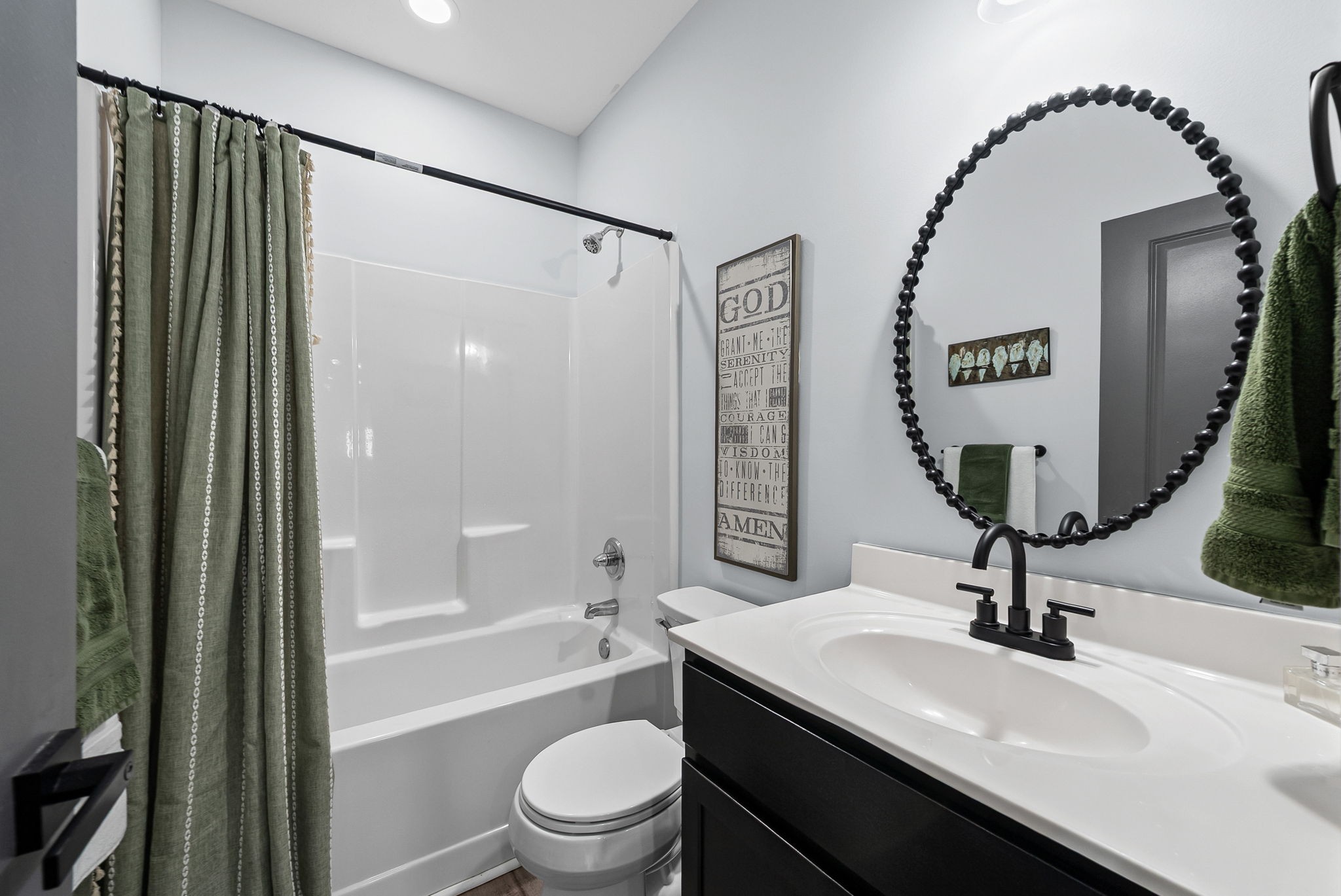 1698 Montgomery Church Road Cadiz, KY 42211 - Photo 18 of 39 a bathroom with a sink a toilet and a mirror