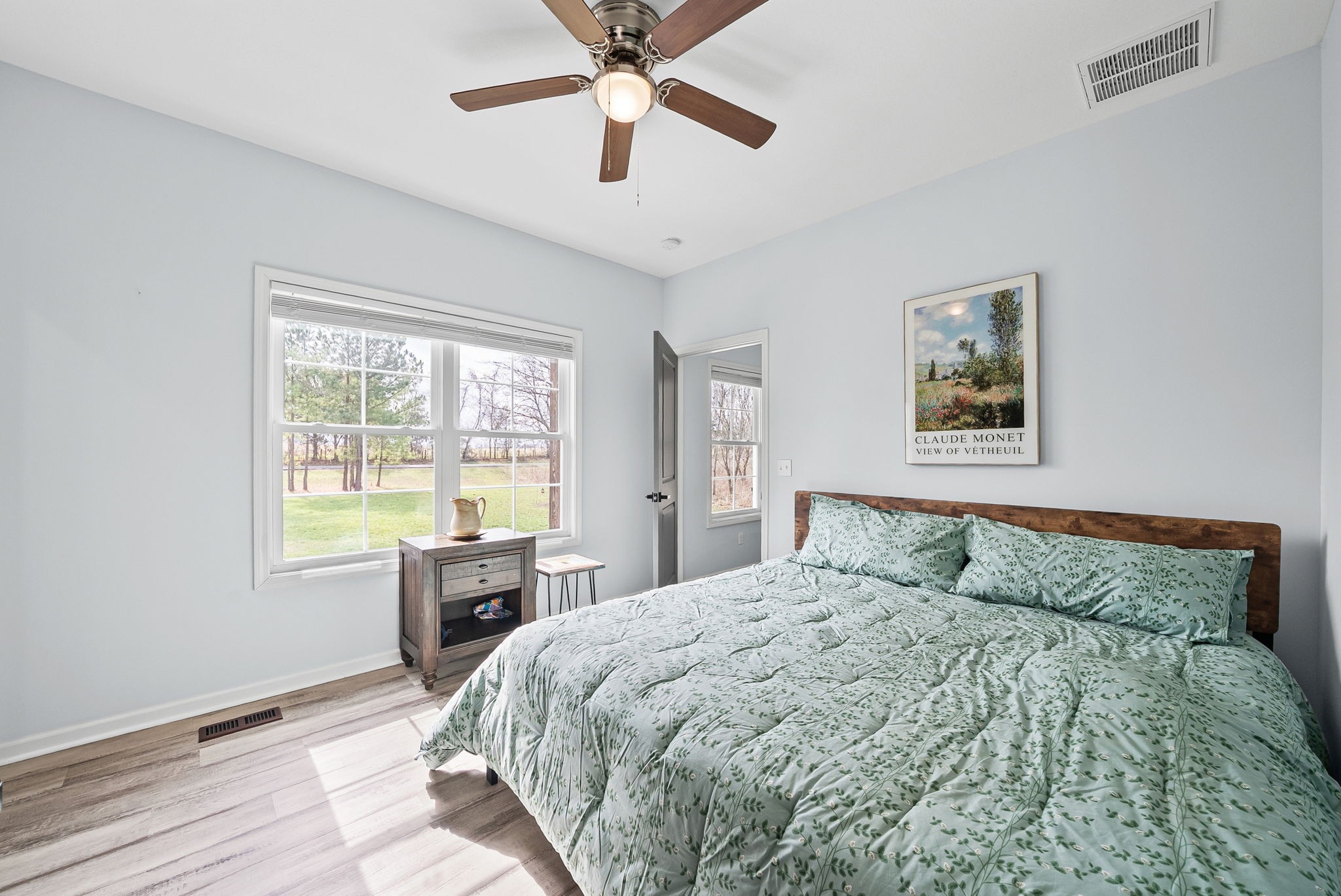 1698 Montgomery Church Road Cadiz, KY 42211 - Photo 23 of 39 a bedroom with a large bed and a window