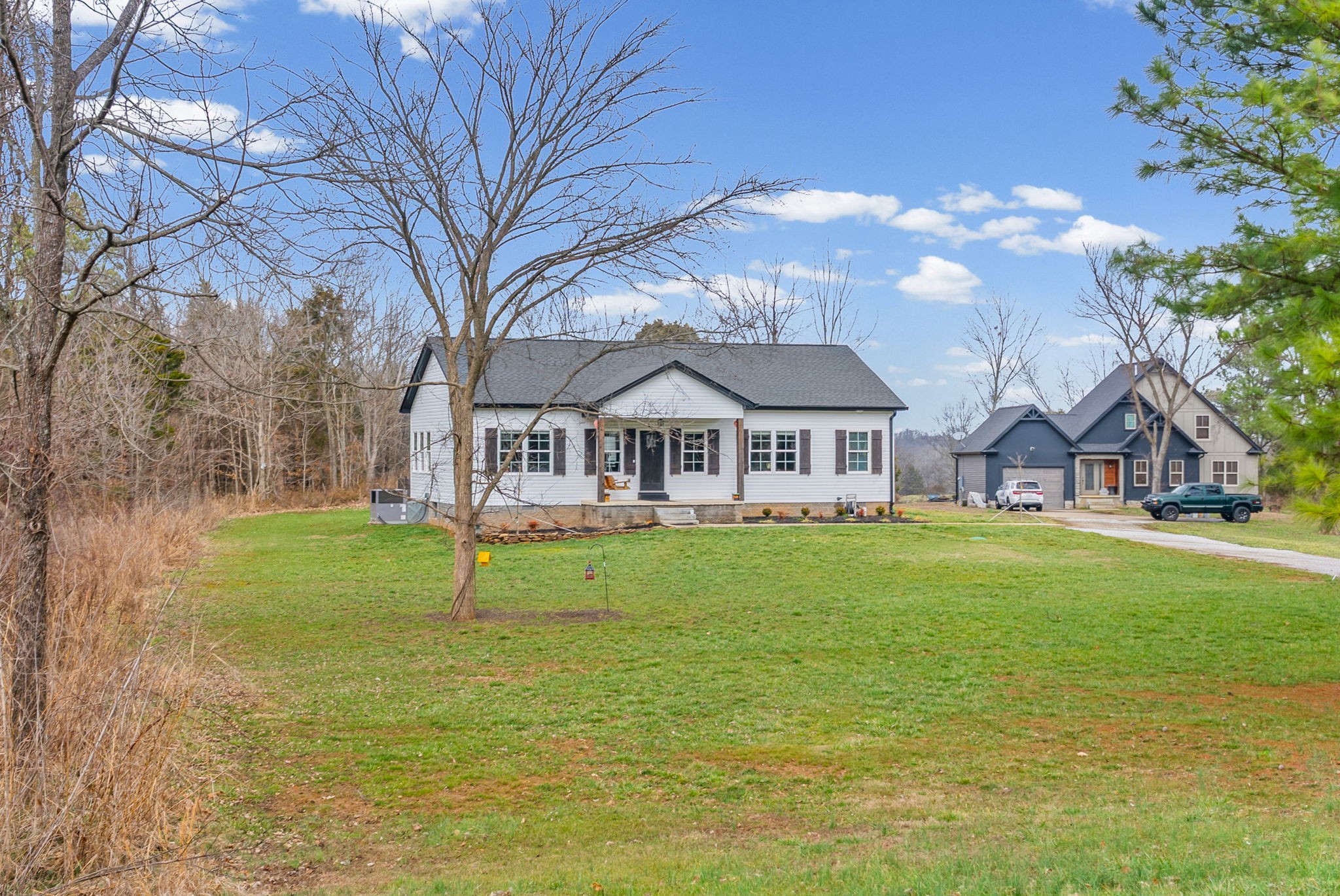 1698 Montgomery Church Road Cadiz, KY 42211 - Photo 32 of 39 a house with garden in front of it
