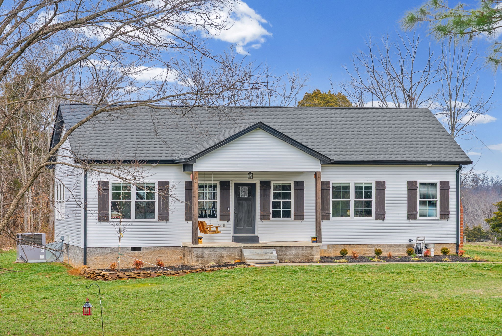 1698 Montgomery Church Road Cadiz, KY 42211 - Photo 5 of 39 a view of house with a yard chairs and large tree