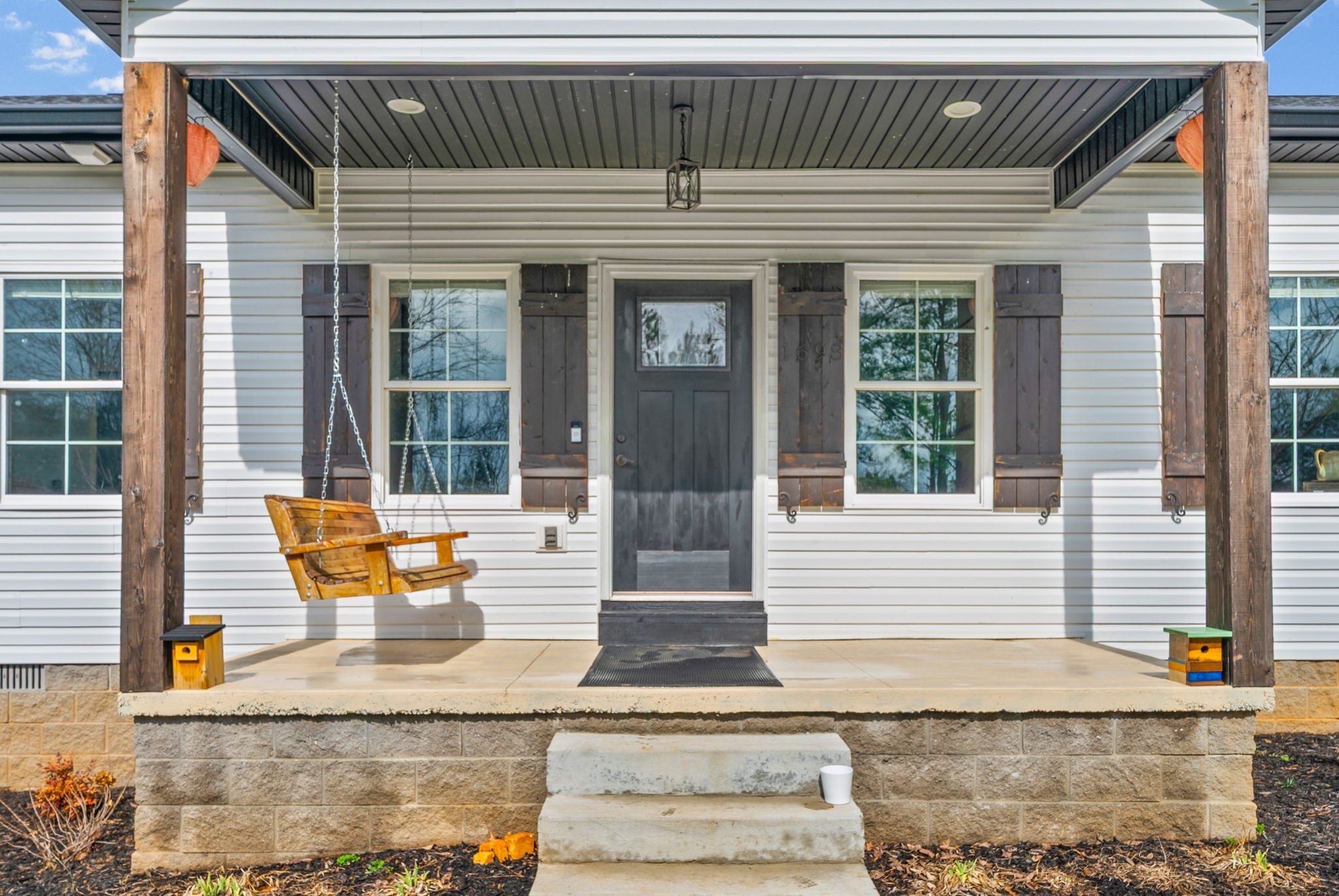 1698 Montgomery Church Road Cadiz, KY 42211 - Photo 6 of 39 a front view of a house with a garden