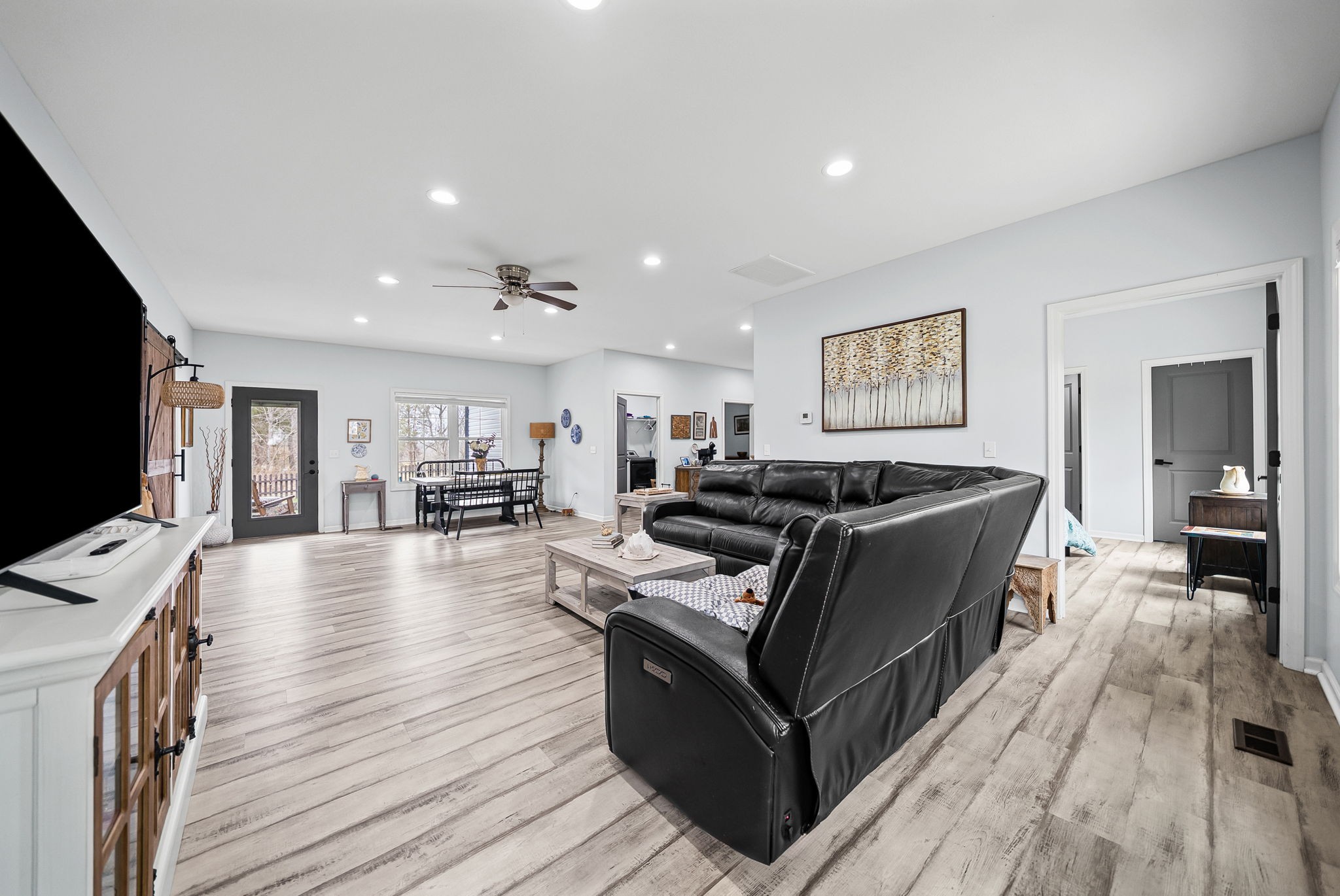 1698 Montgomery Church Road Cadiz, KY 42211 - Photo 7 of 39 a living room with furniture and a flat screen tv