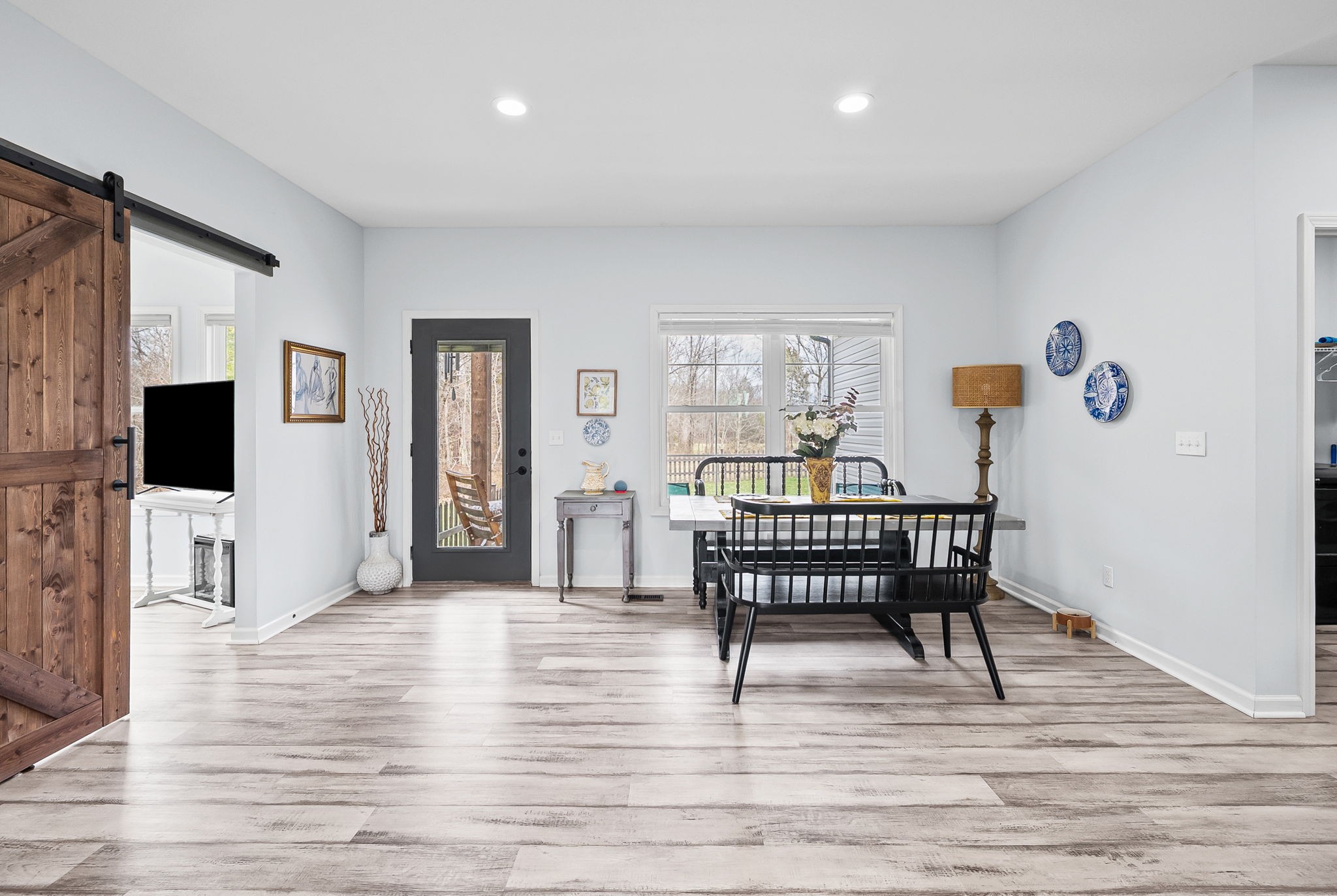 1698 Montgomery Church Road Cadiz, KY 42211 - Photo 9 of 39 a living room with furniture and a flat screen tv