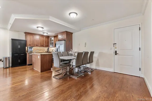 a view of kitchen with cabinets and wooden floor