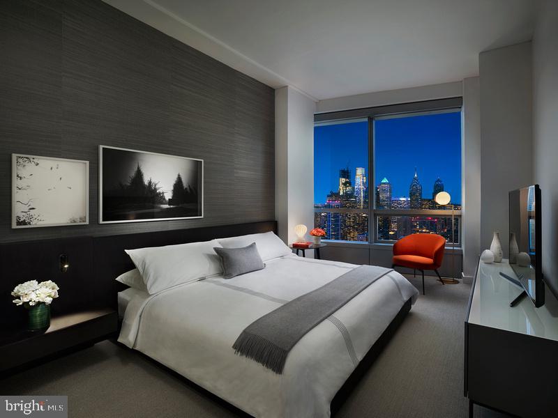 2930 Walnut Street, Unit 3822 Philadelphia, PA 19104 - Photo 33 of 33 a bedroom with bed and window