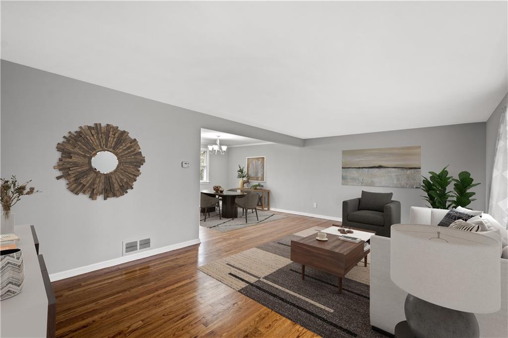 29 Carleton Drive Pittsburgh, PA 15243 - Photo 3 of 25 a living room with furniture and a fireplace