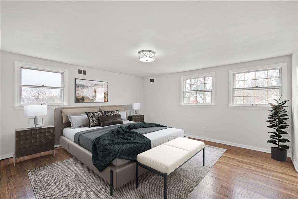 29 Carleton Drive Pittsburgh, PA 15243 - Photo 10 of 25 a bedroom with a bed and wooden floor