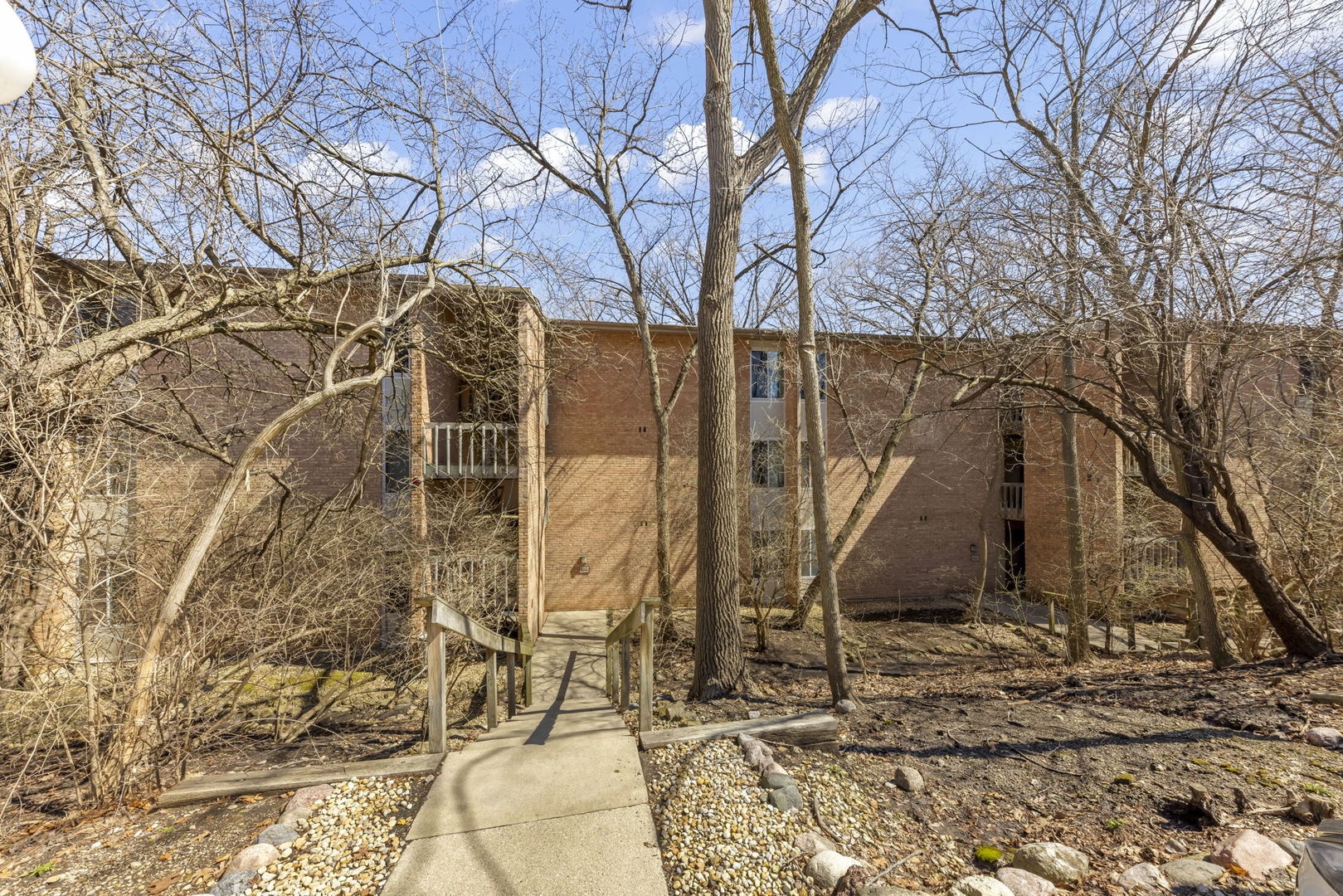 6010 Forest View Road, Unit 3A Lisle, IL 60532 - Photo 19 of 20 a view of a yard with large trees