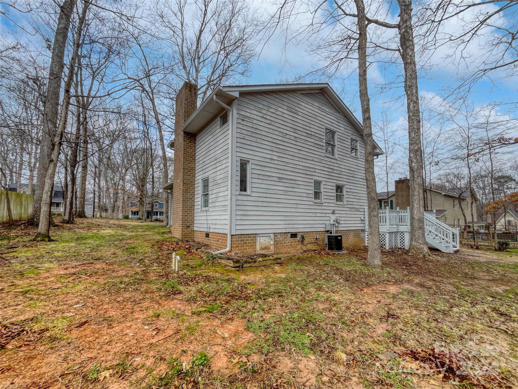 506 Ralph Handsel Boulevard Stanley, NC 28164 - Photo 17 of 18 a view of a house with a yard