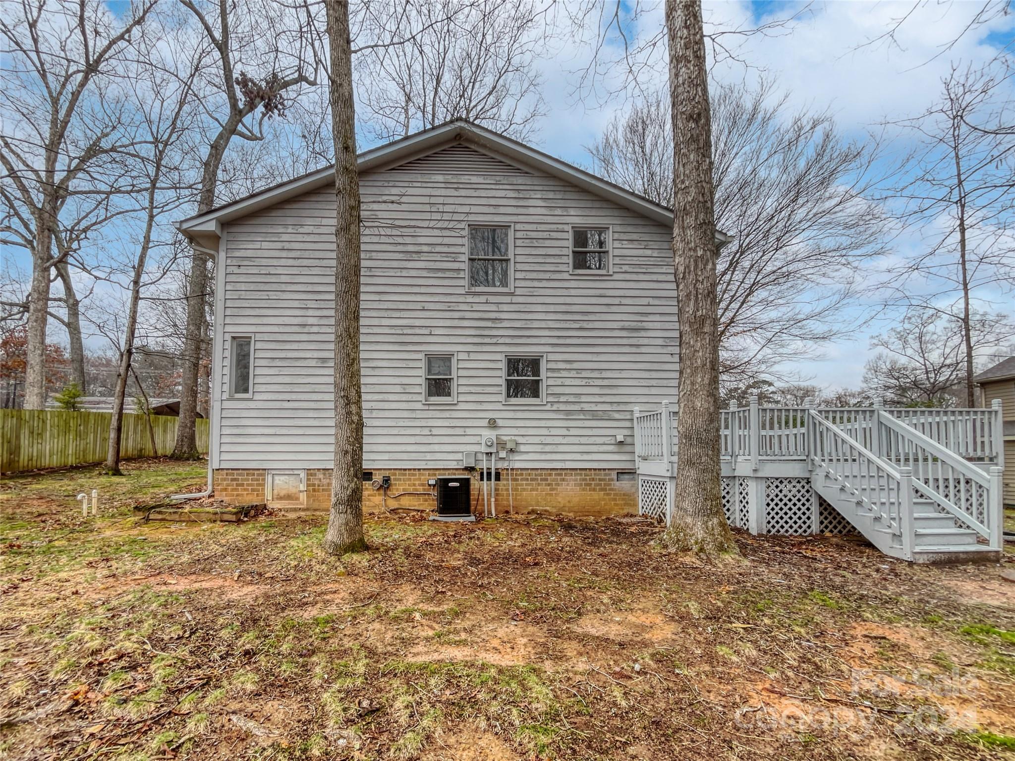 506 Ralph Handsel Boulevard Stanley, NC 28164 - Photo 18 of 18 a view of a house with a yard