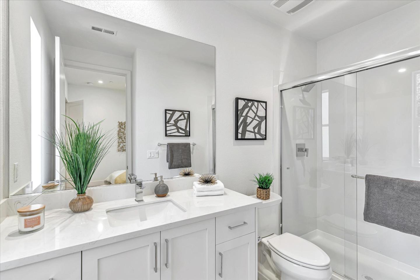 326 Isabelline Court San Ramon, CA 94583 - Photo 26 of 35 a bathroom with a granite countertop sink a toilet and shower