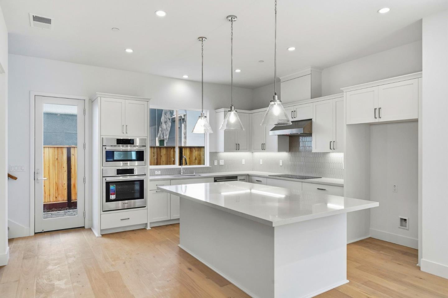326 Isabelline Court San Ramon, CA 94583 - Photo 5 of 24 a kitchen with stainless steel appliances granite countertop a sink a stove and a refrigerator