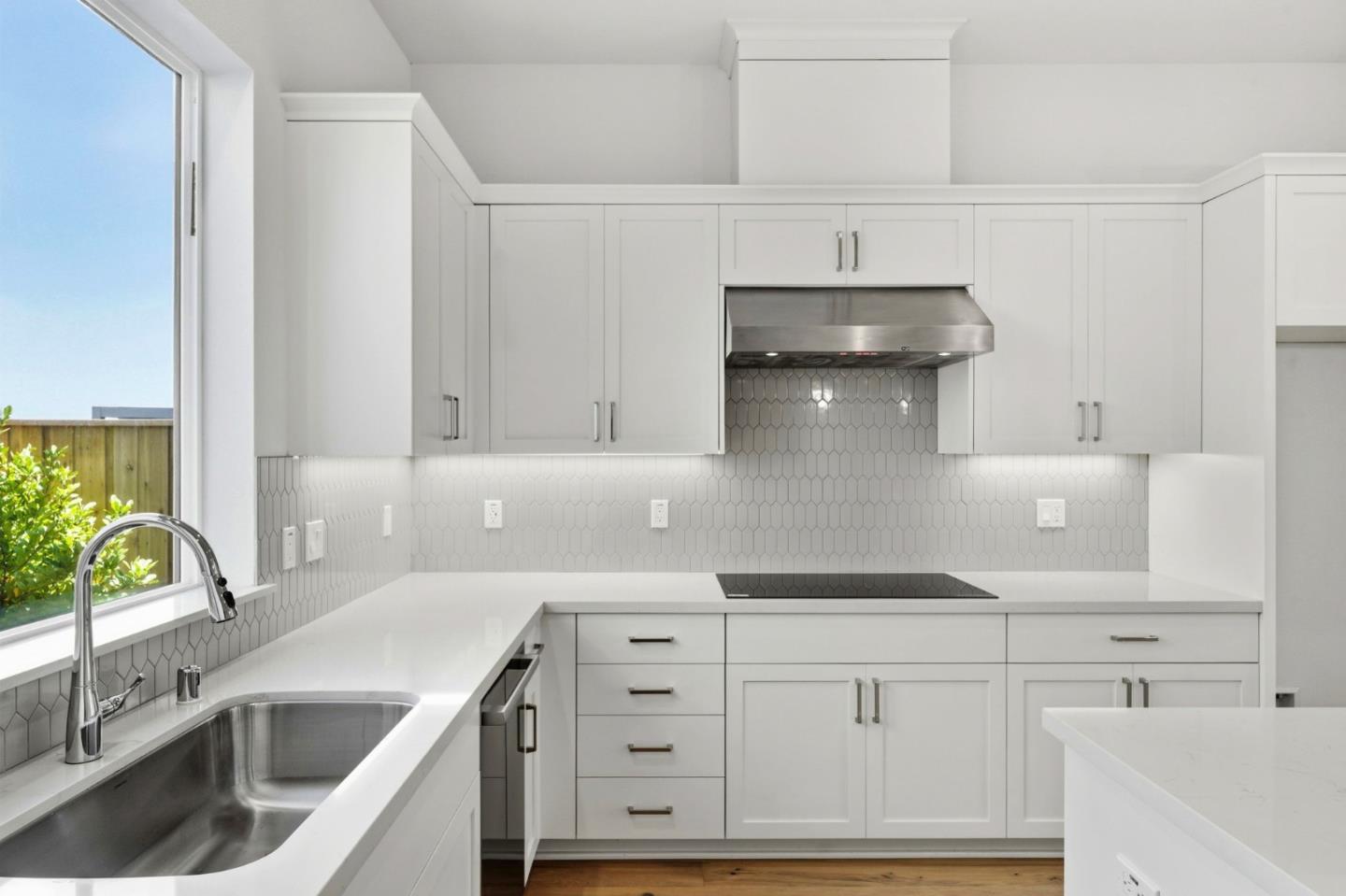 326 Isabelline Court San Ramon, CA 94583 - Photo 7 of 24 a kitchen with stainless steel appliances granite countertop a sink and a stove