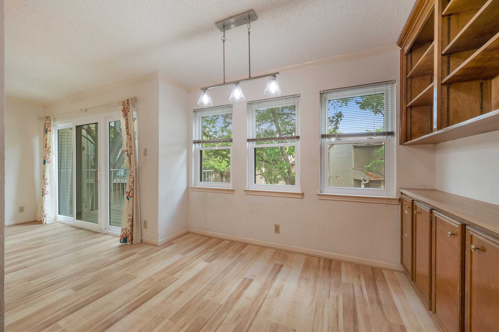 3845 Ranch Road 2222, Unit 19 Austin, TX 78731 - Photo 18 of 38 The dining area is large enough for a full-sized table, making it easy to transition from casual meals to hosting guests