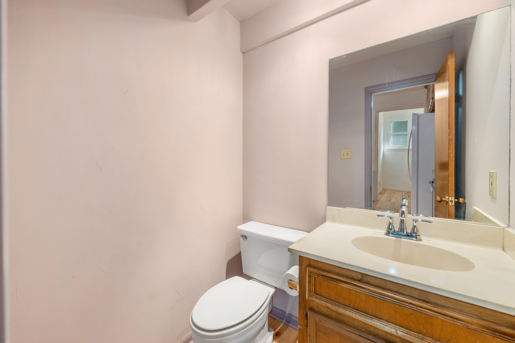 3845 Ranch Road 2222, Unit 19 Austin, TX 78731 - Photo 19 of 38 A half-bathroom on the second level serves guests so they don't have to go upstairs to the bedroom floors