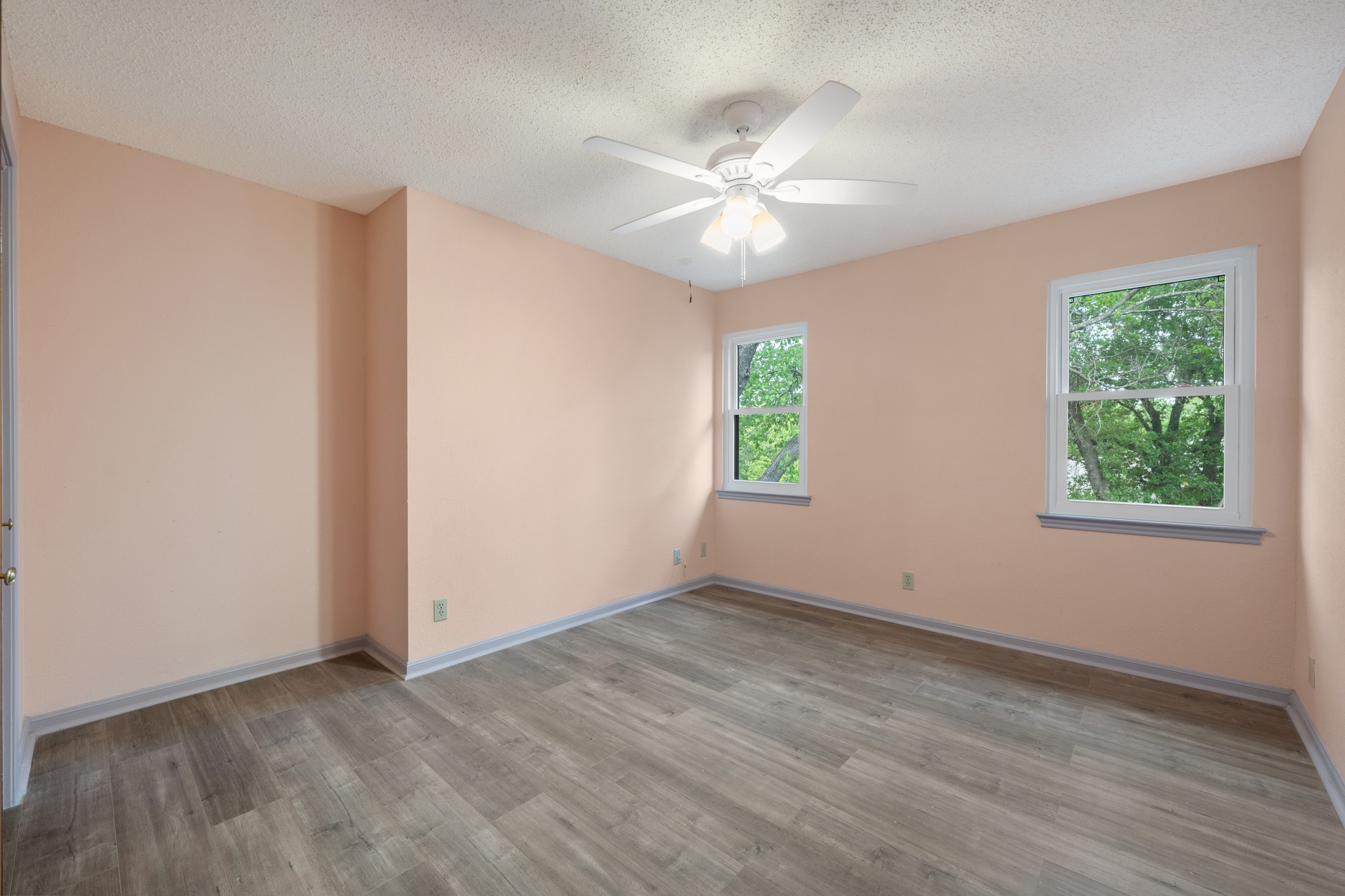 3845 Ranch Road 2222, Unit 19 Austin, TX 78731 - Photo 24 of 38 The second bedroom on the top floor offers a quiet space for a home office or a roommate