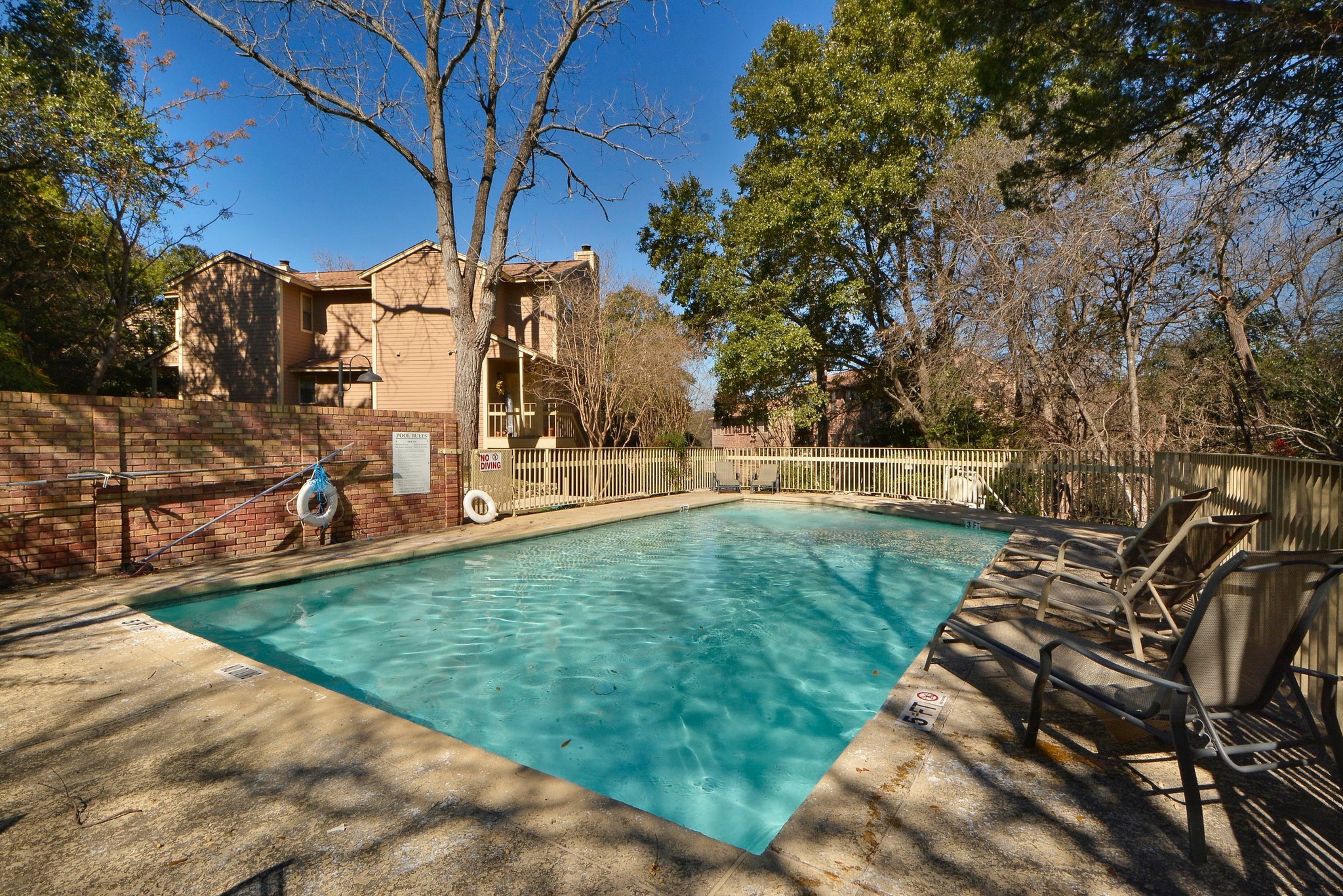 3845 Ranch Road 2222, Unit 19 Austin, TX 78731 - Photo 30 of 38 Plenty of lounge space around the water makes it easy to enjoy the Austin weather