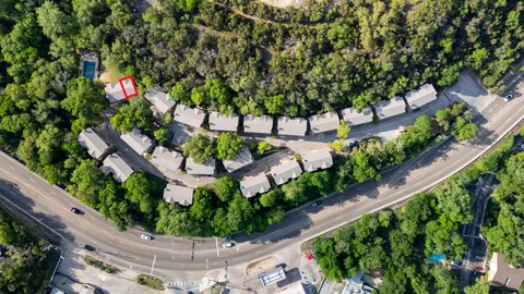 a side view of a house with a yard