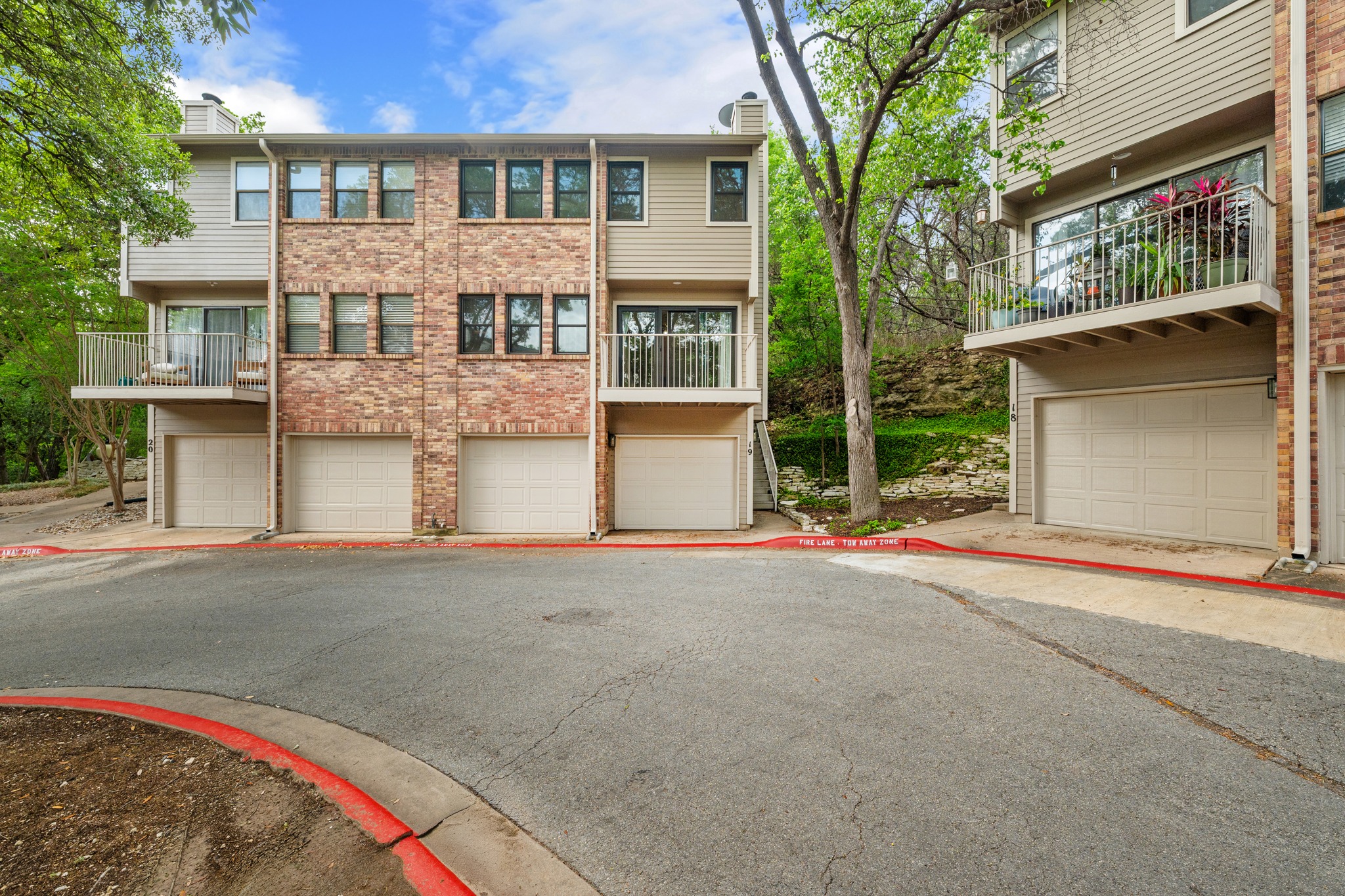 3845 Ranch Road 2222, Unit 19 Austin, TX 78731 - Photo 7 of 38 This Terraces condo features a distinct three-story layout with a private, ground-floor entrance that feels like a townhome