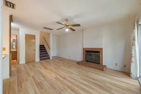 a kitchen with stainless steel appliances a refrigerator and a stove top oven