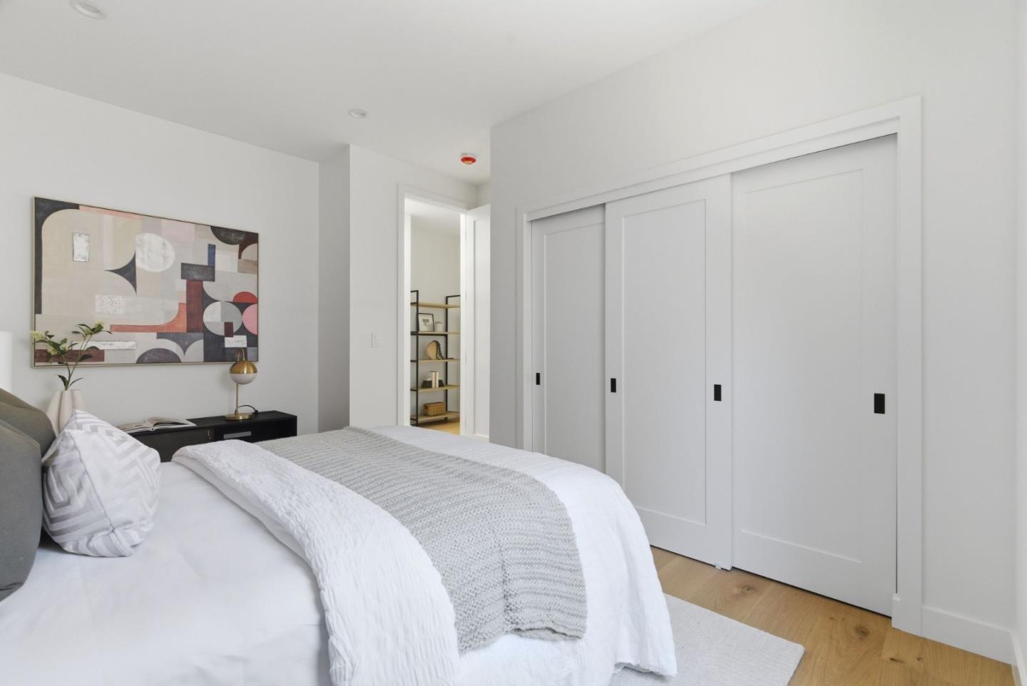 680 North San Antonio Road Los Altos, CA 94022 - Photo 12 of 19 a bedroom with a bed and a painting on the wall