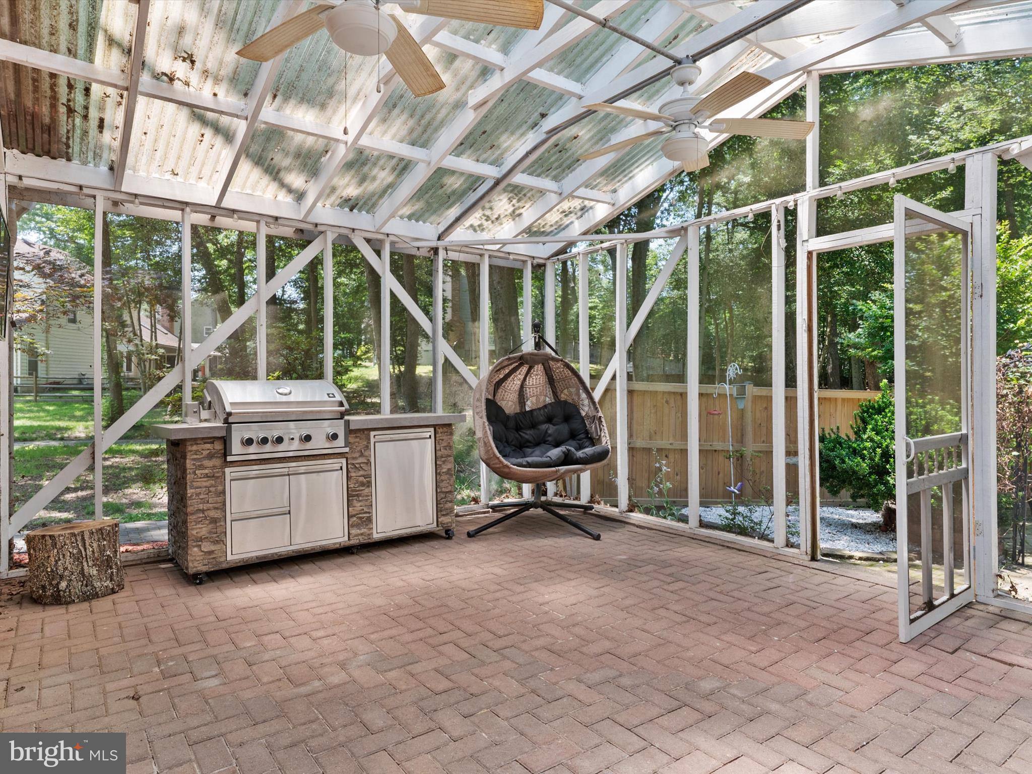 3570 Pine Cone Circle Waldorf, MD 20602 - Photo 20 of 43 a view of a room with gym equipment and floor to ceiling window