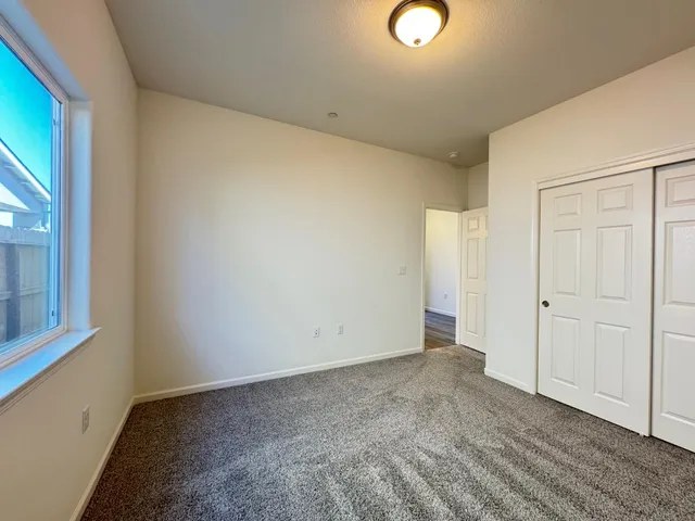 a kitchen with granite countertop white cabinets and a granite counter tops