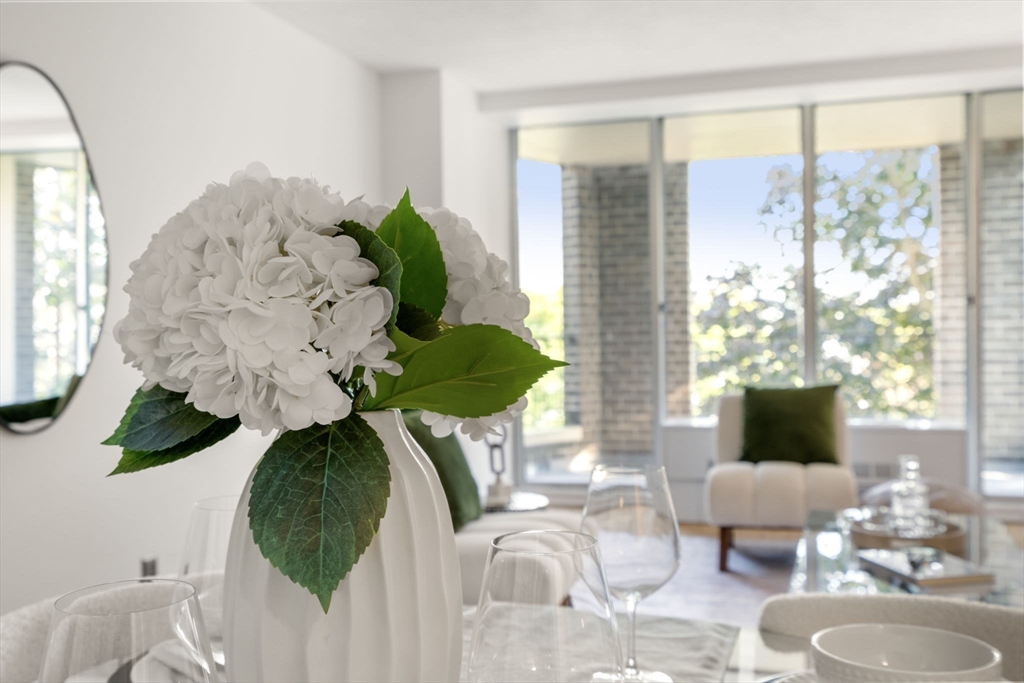 33 Pond Avenue, Unit 523 Brookline, MA 02445 - Photo 11 of 31 a view of living room with furniture and a large window