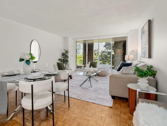a living room with furniture and window