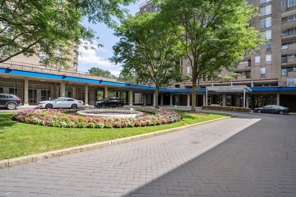 33 Pond Avenue, Unit 523 Brookline, MA 02445 - Photo 24 of 31 a front view of house with yard and green space