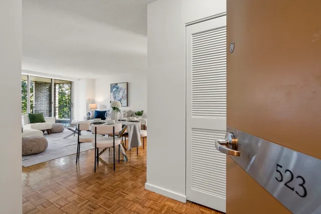 a view of a livingroom with furniture and window