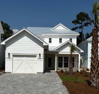 276 Sugar Sands Drive Santa Rosa Beach, FL 32459 - Photo 1 of 16 a view of a house with a yard and potted plants
