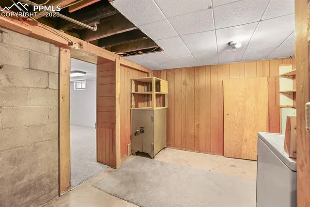 a balcony with wooden floor and fence