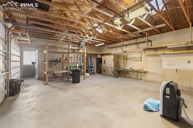 an aerial view of residential house with parking space