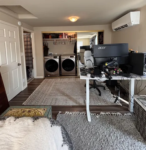 a utility room with dryer and washer