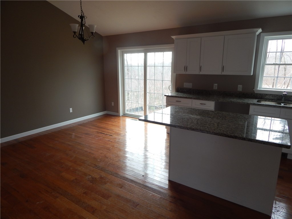 82 Stone Barn Road Burrillville, RI 02859 - Photo 3 of 14 Dinning Room hardwood floors