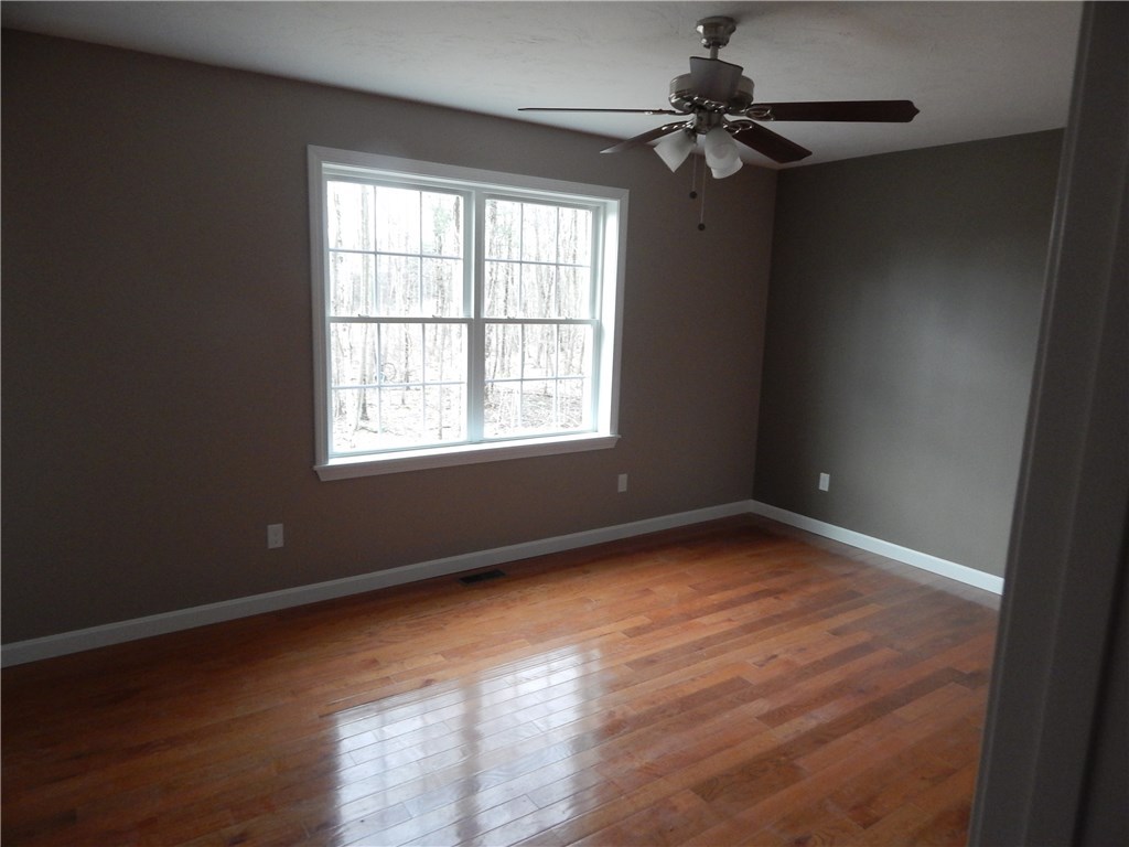 82 Stone Barn Road Burrillville, RI 02859 - Photo 8 of 14 Master Bedroom hardwood floors