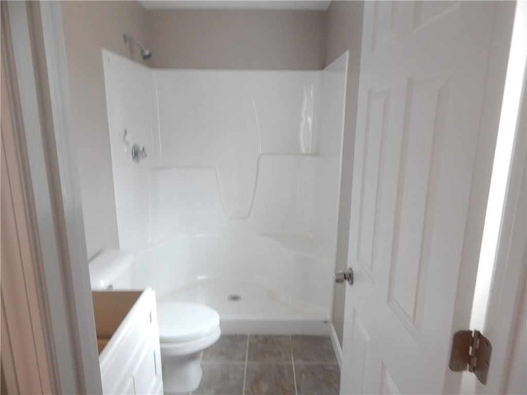 82 Stone Barn Road Burrillville, RI 02859 - Photo 10 of 14 Master bath with tile floor.