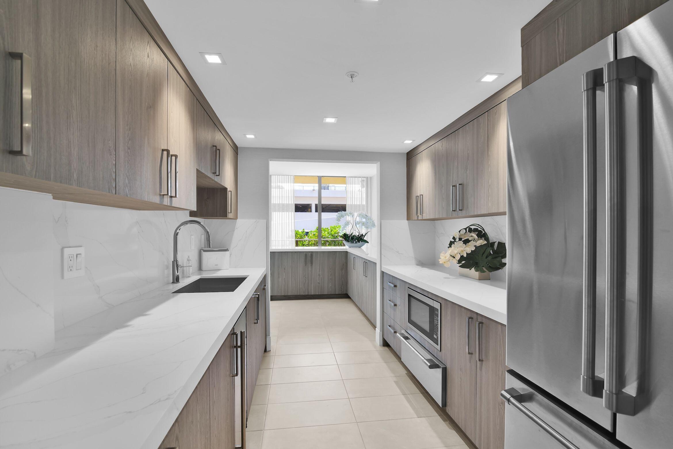 899 Jeffery Street, Unit 714 Boca Raton, FL 33487 - Photo 48 of 51 Porta Bella east Club room kitchen