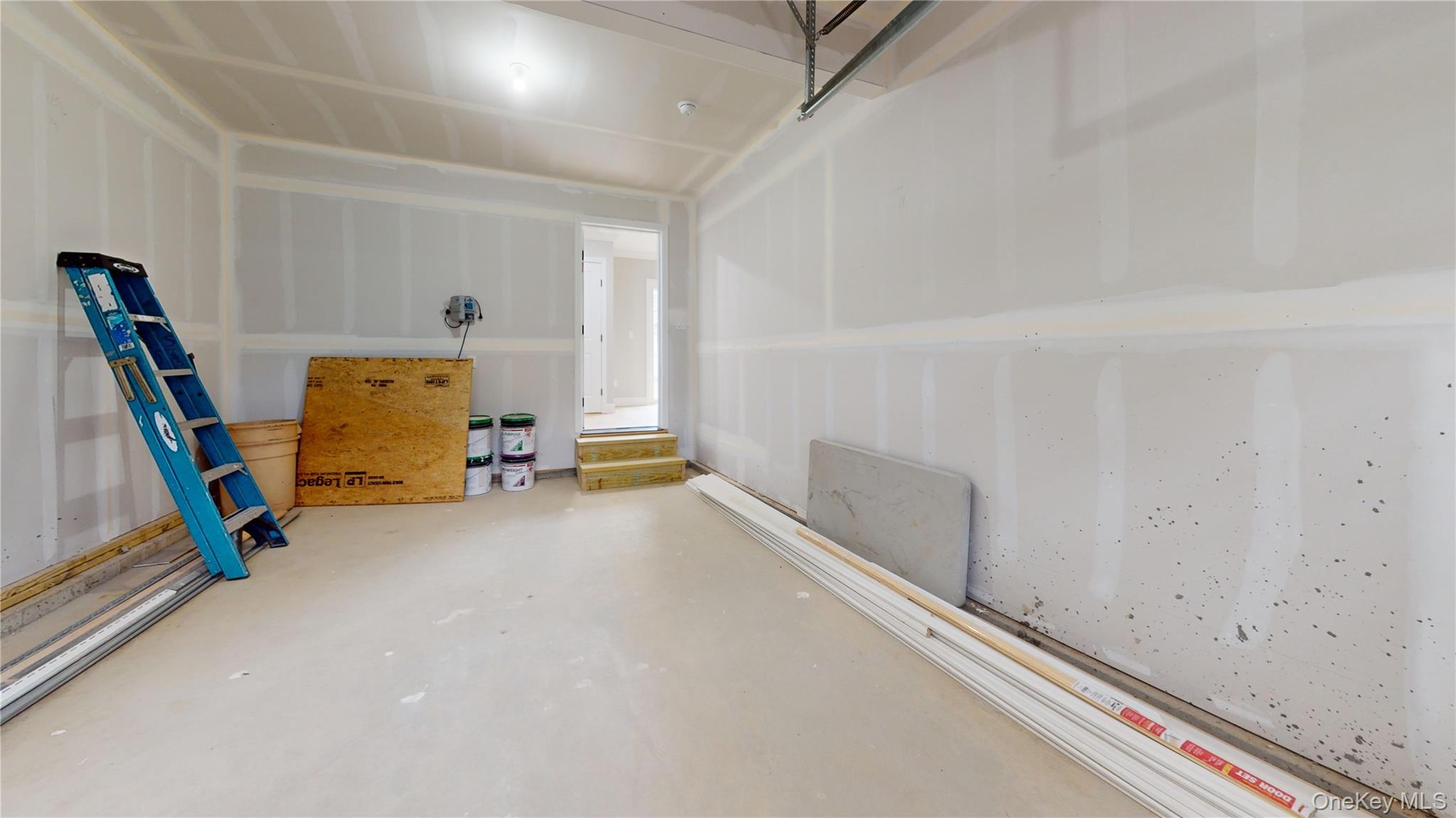 492 Blue Point Road Farmingville, NY 11738 - Photo 18 of 21 a view of a room with gym equipment