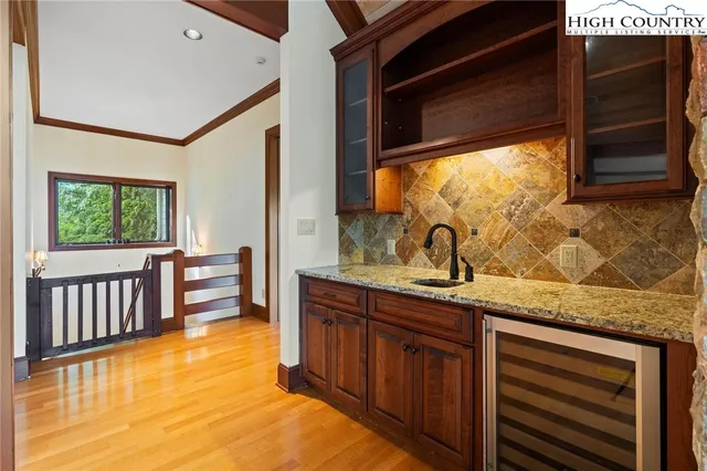 a kitchen with sink and window
