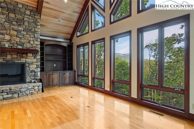 a view of a living room cabinets and a flat screen tv