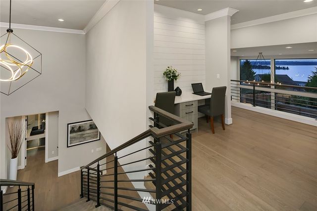 a view of a workspace with furniture