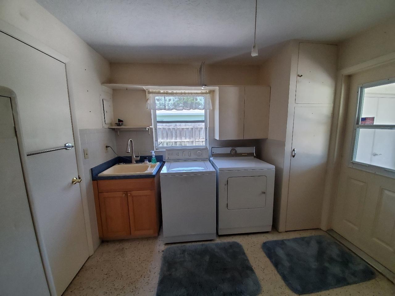 257 Davis Road Palm Springs, FL 33461 - Photo 54 of 58 65. Laundry room 1